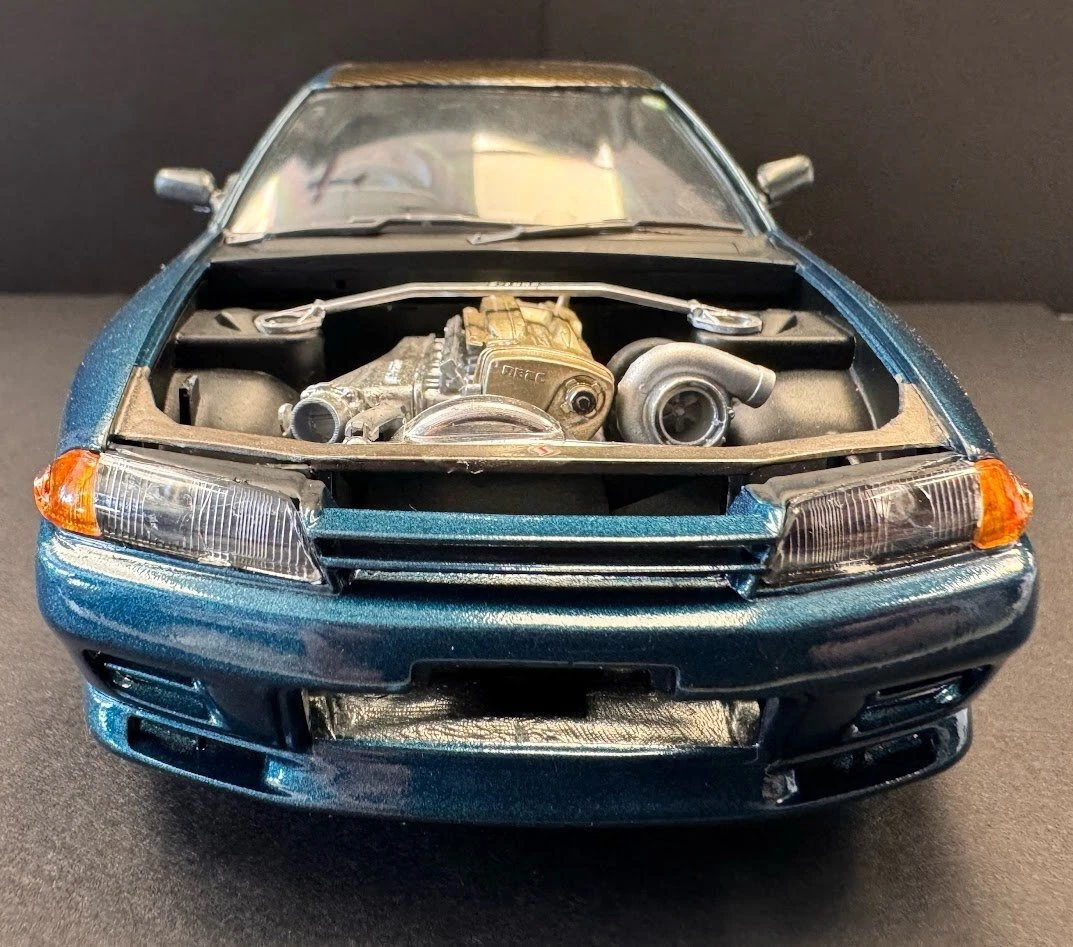 Head on shot - lights, front grill, engine