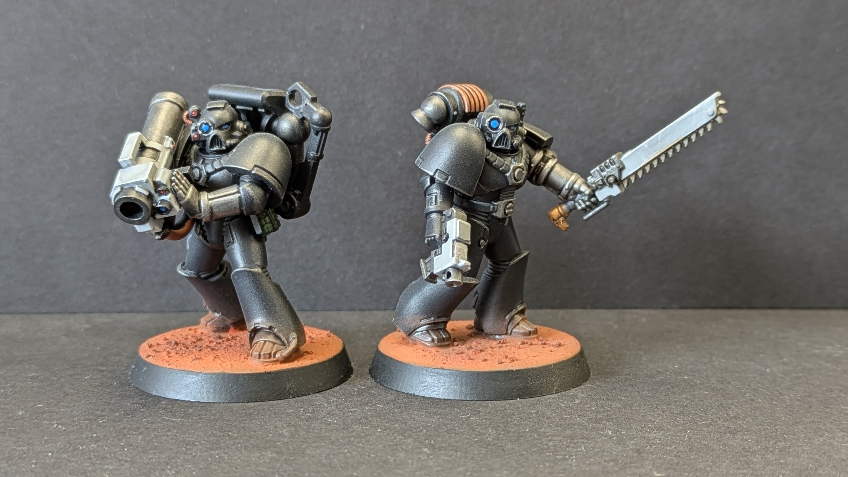 Two Iron Hands - chainsword and rockets