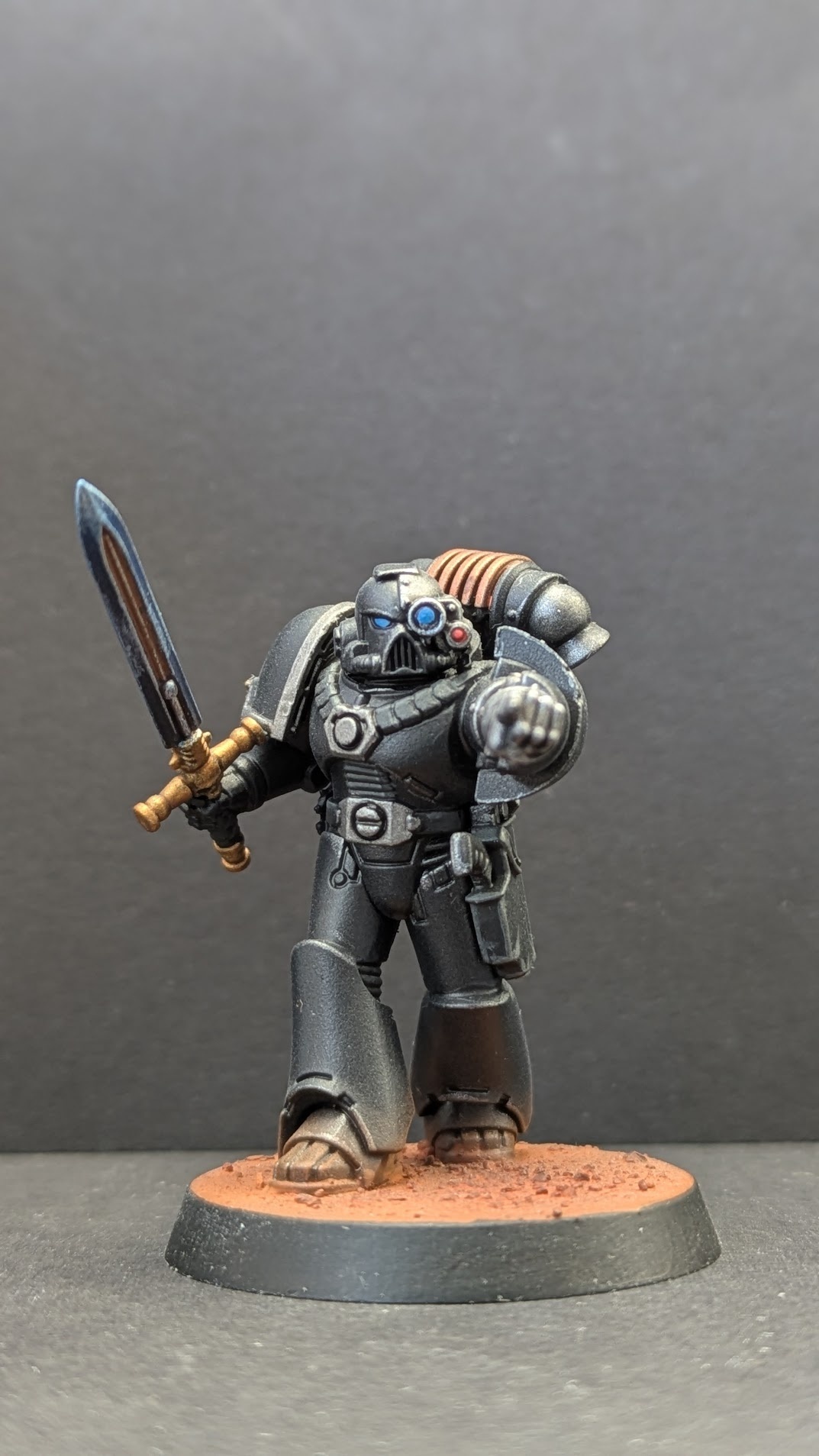 Power sword Iron Warrior walking toward camera