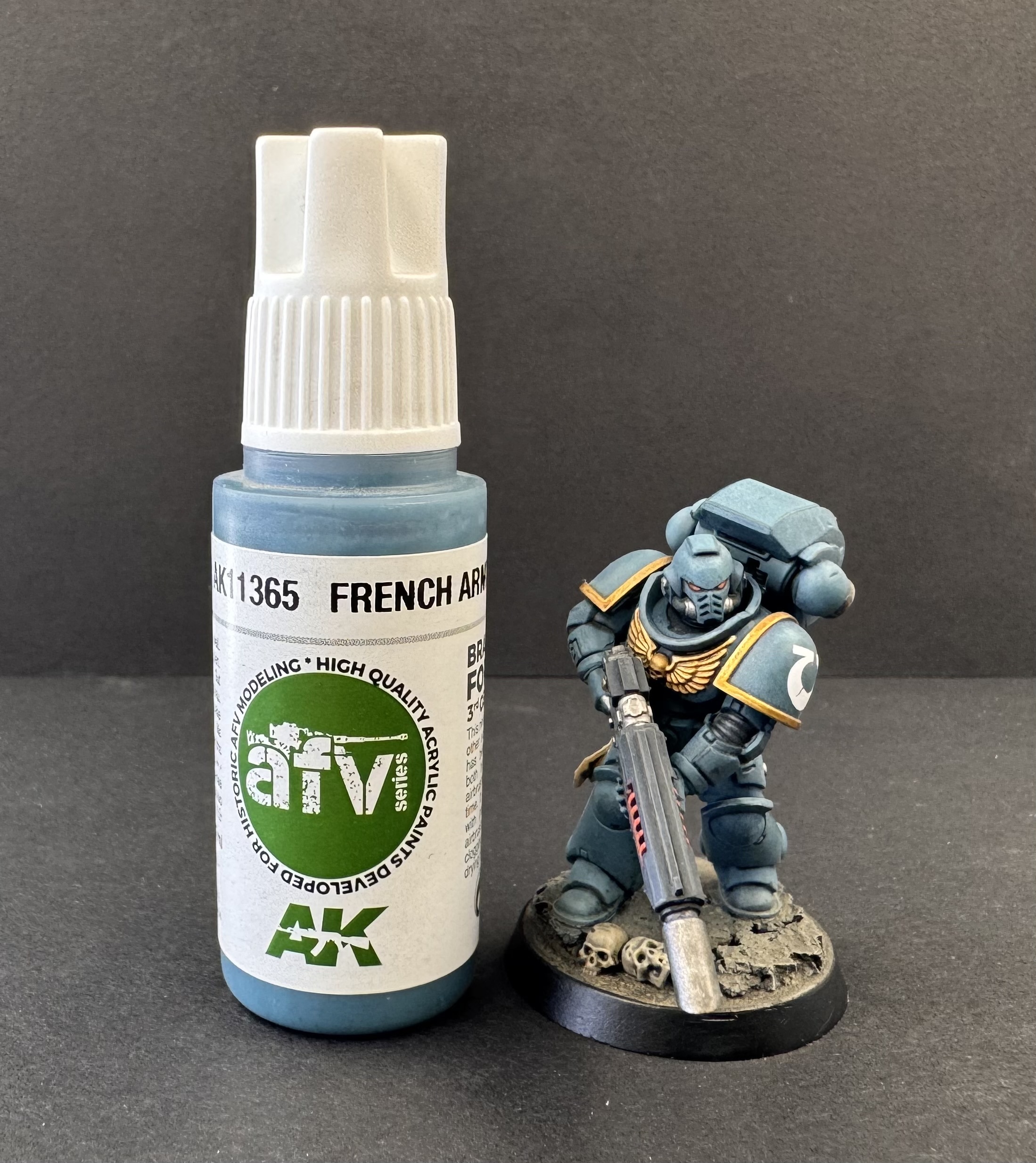 Marine posed with the base paint coat reference