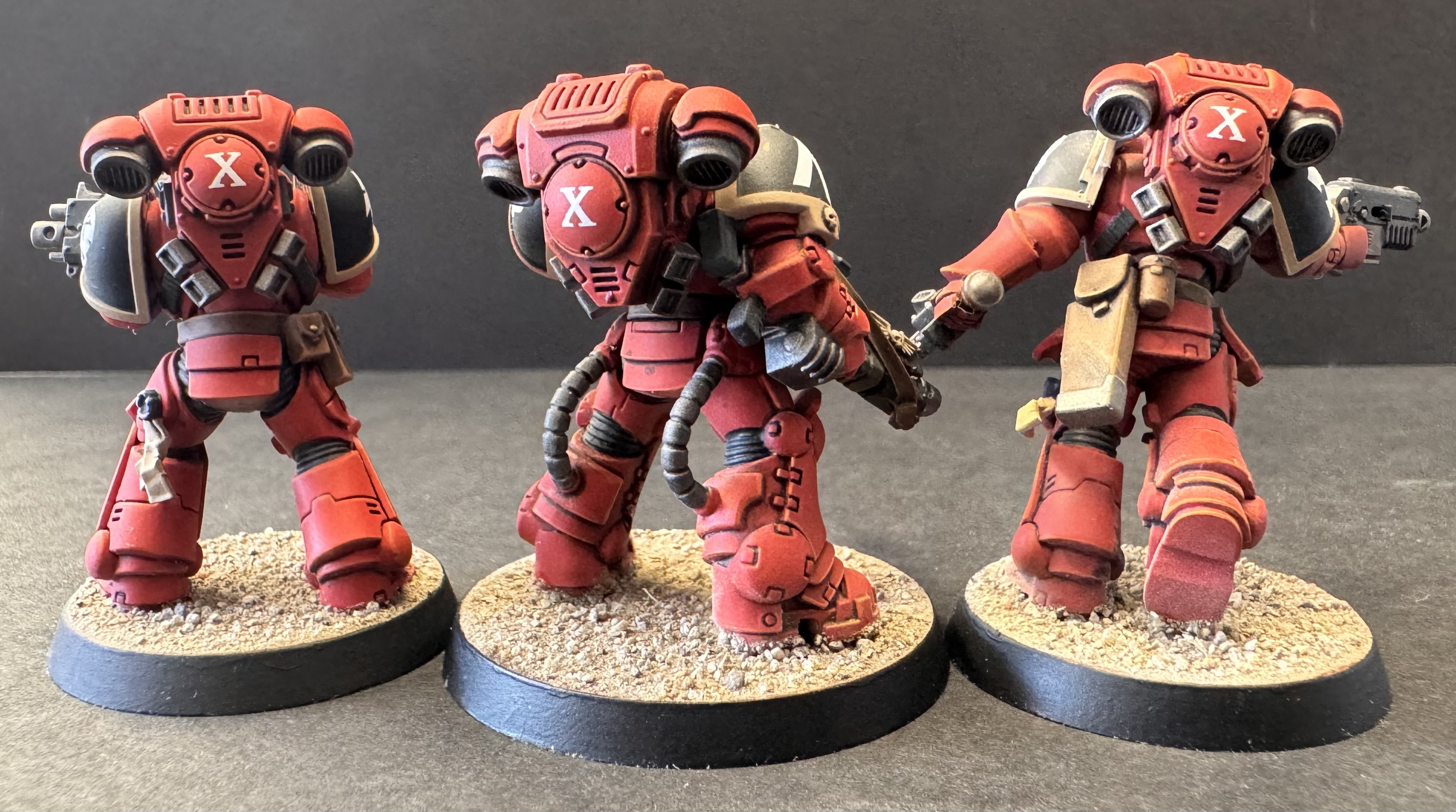 Squad from behind - soft joints, leather and Decimator X icons on backpacks