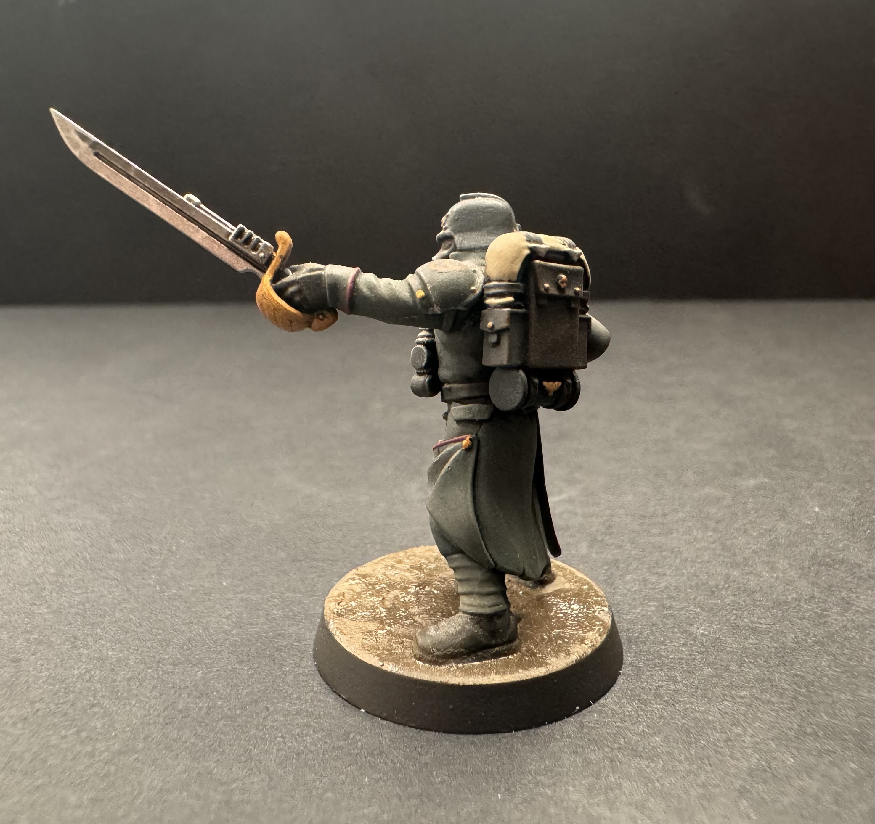 Side profile - sword and backpack