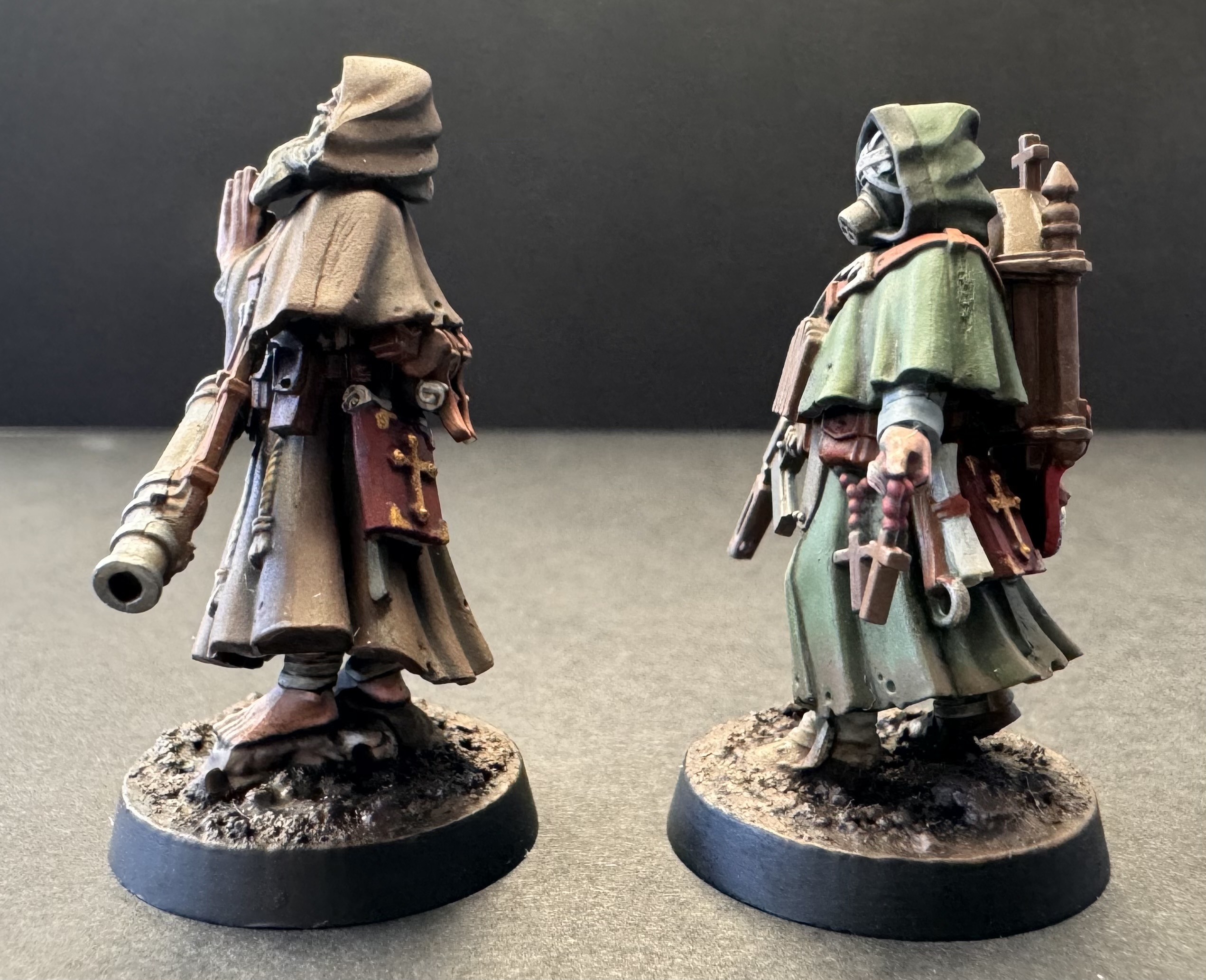 Both snipers - side profile left, showing scrolls and books