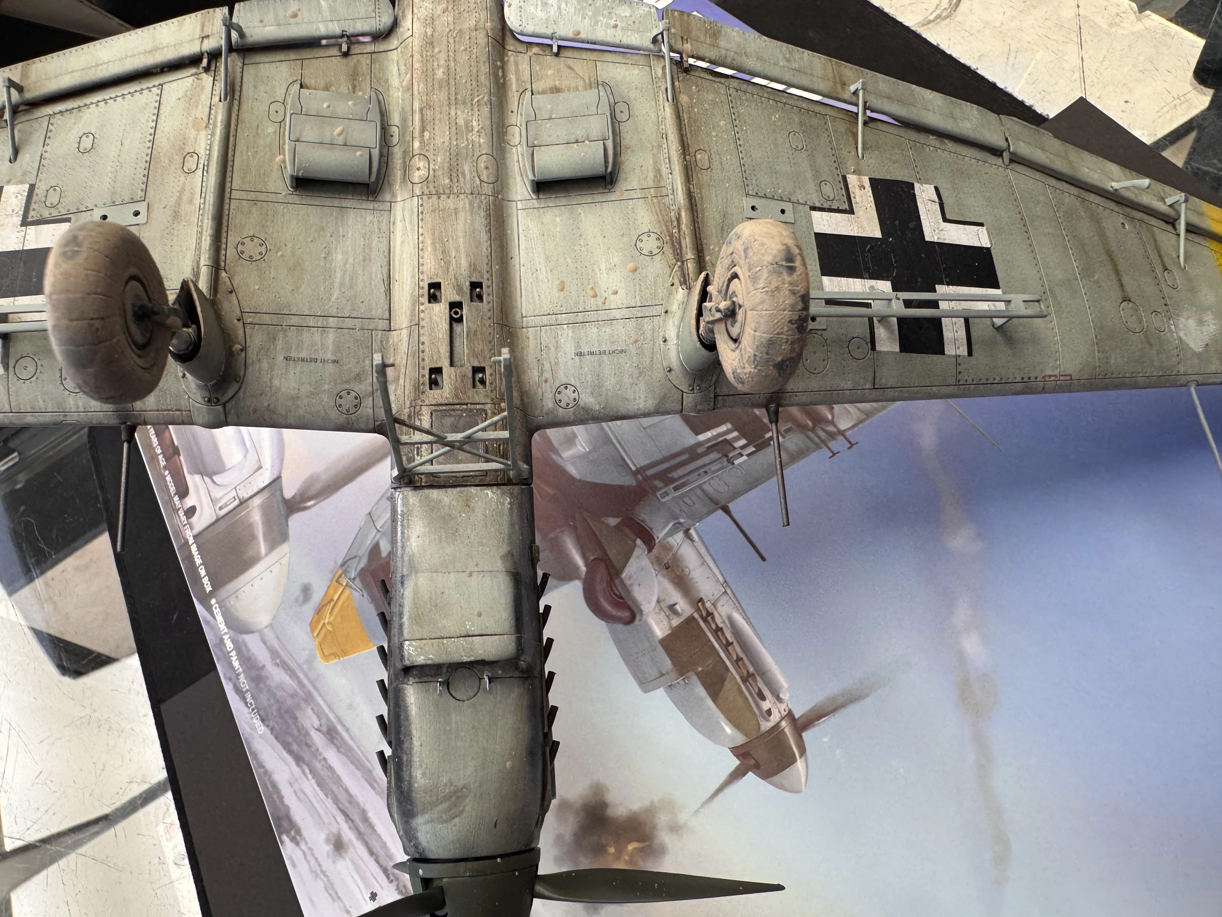 Underside toward nose - front wheels and mud splatter