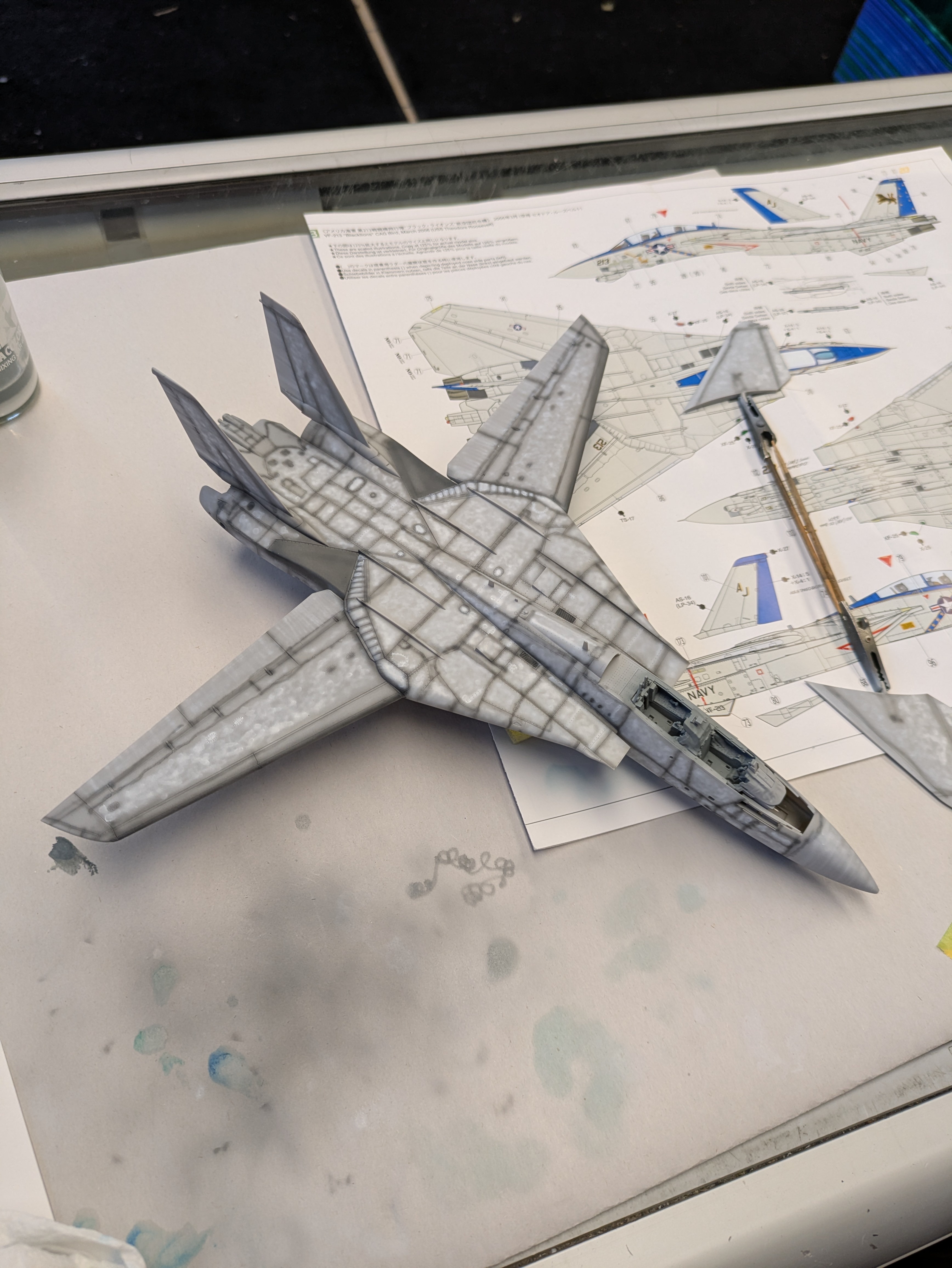 Pre-shaded fuselage top view &mdash; dark grey panel lines and white marbling visible
