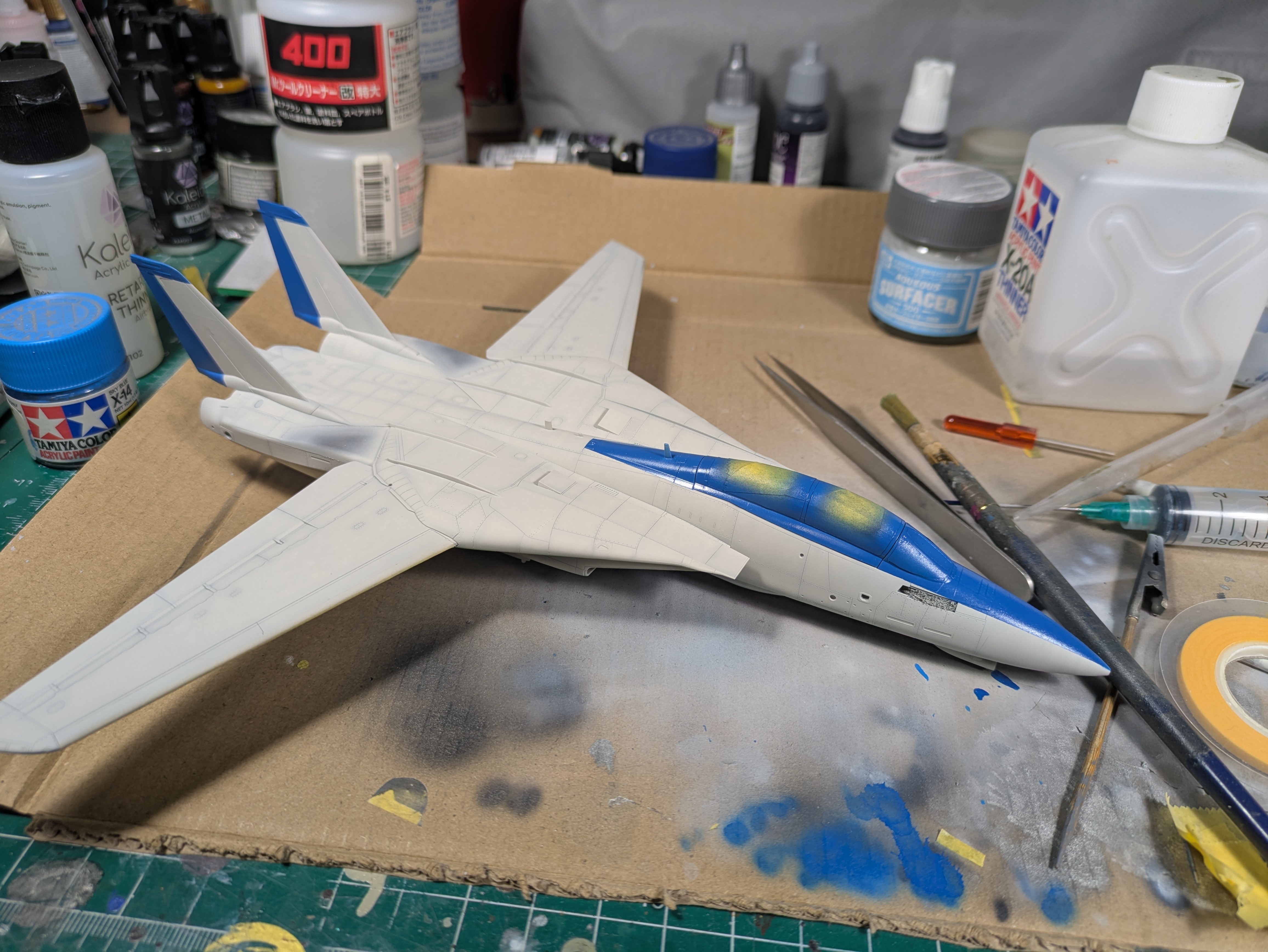 Fuselage side profile with blue airbrushed and masks partially removed