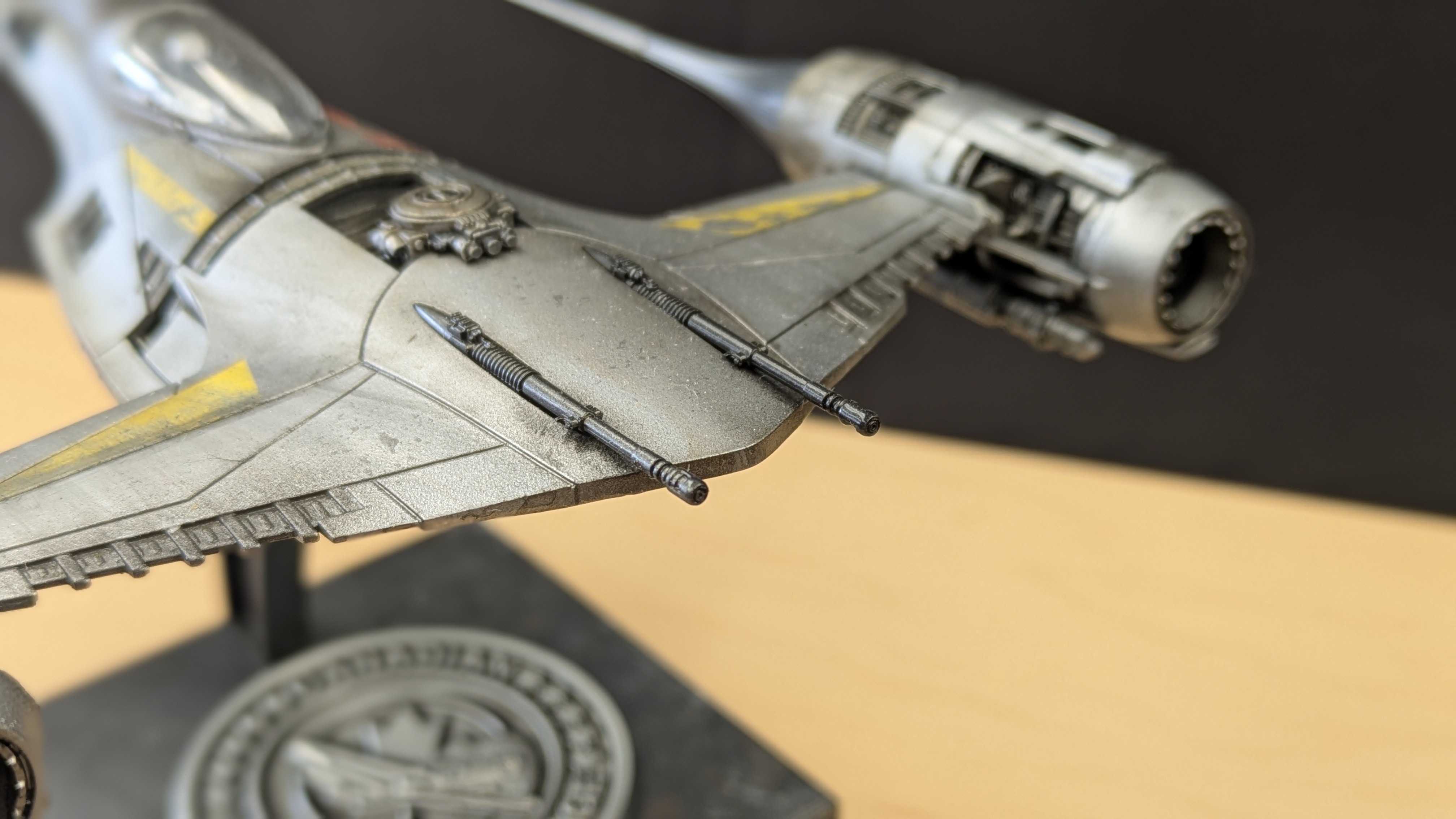N-1 Starfighter wing detail showing panel line weathering and chipped yellow markings