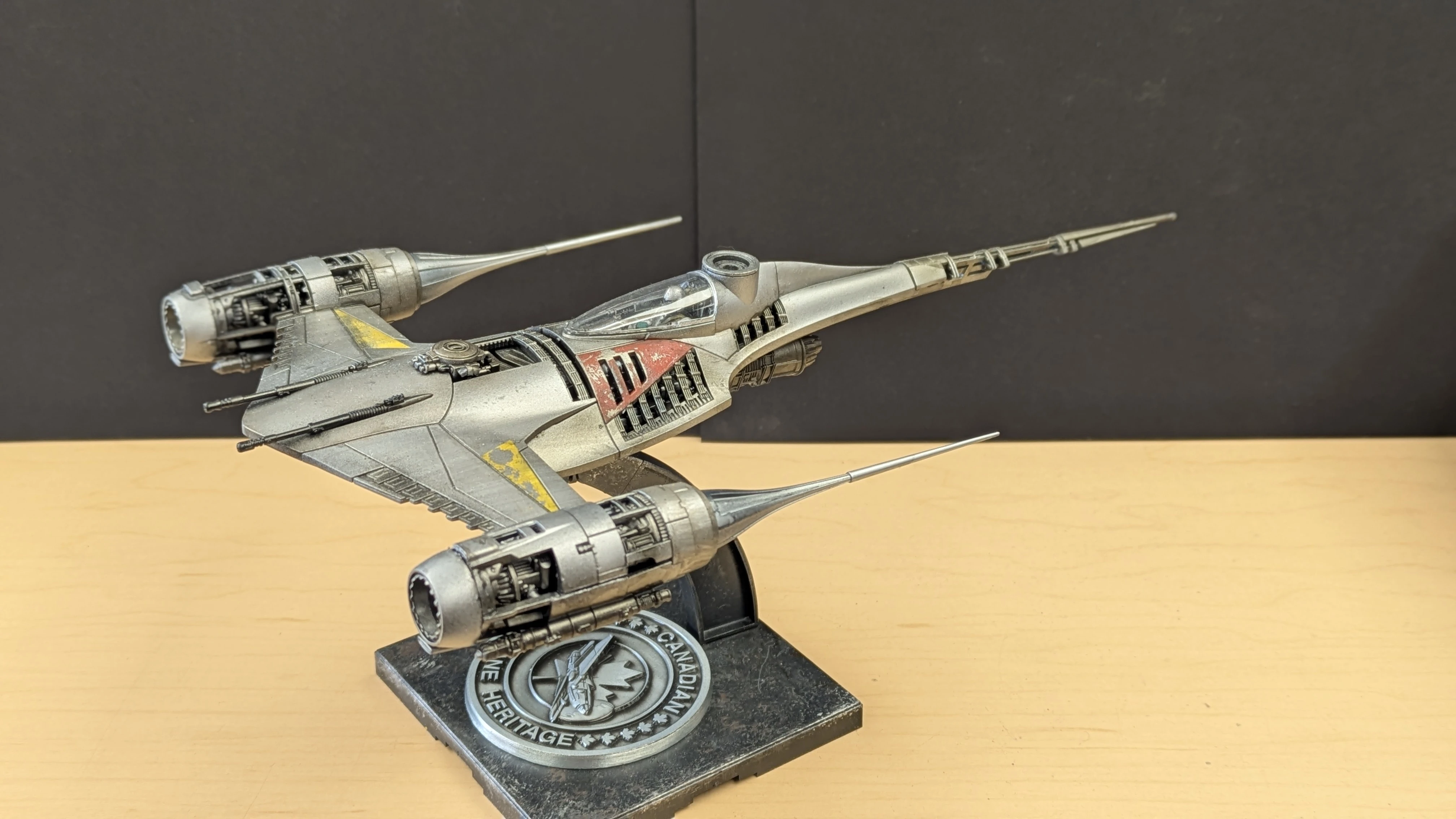 N-1 Starfighter front three-quarter view showing yellow and red markings