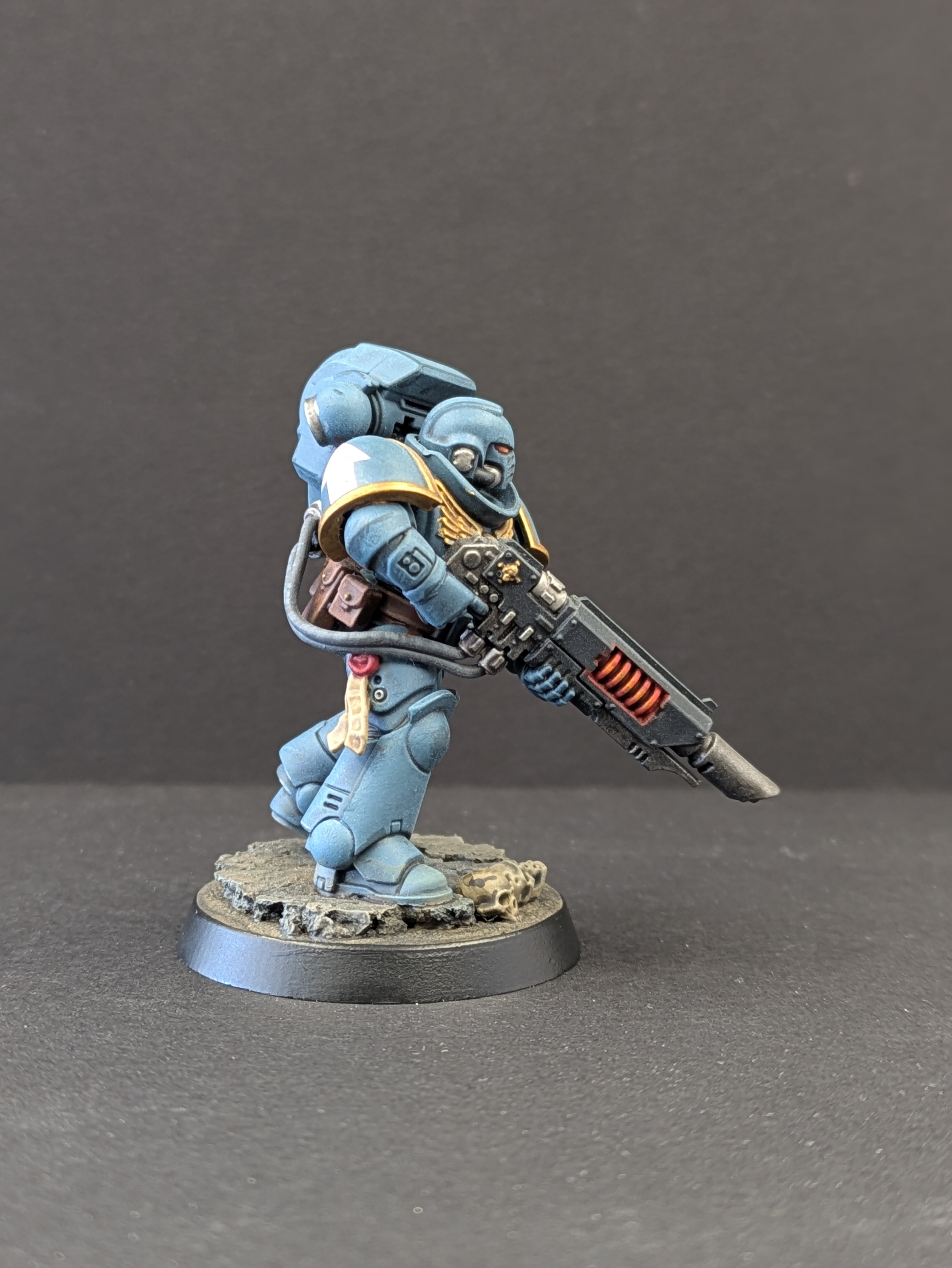 Side profile - rear showing backpack detail