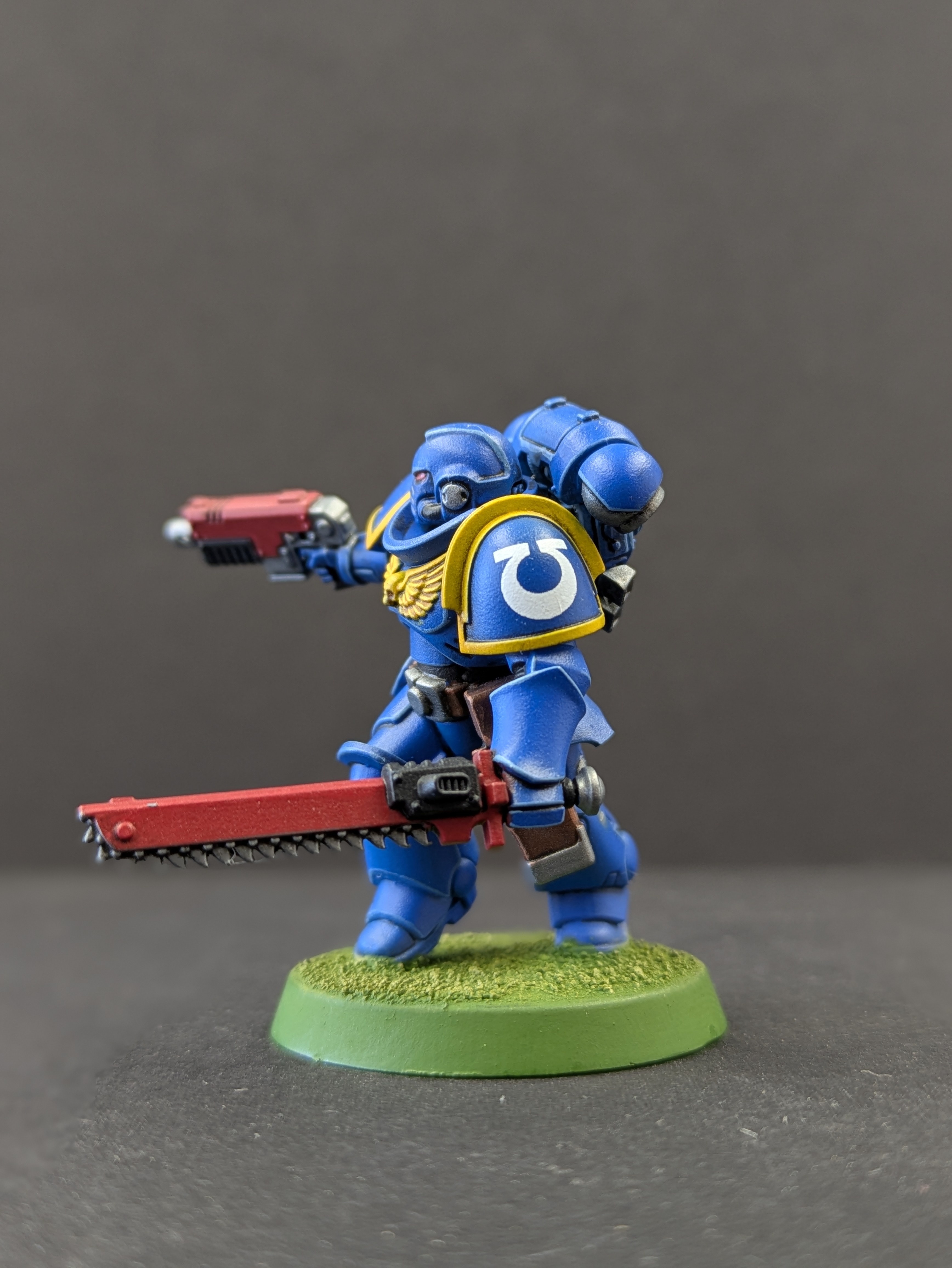 Chainsword and Ultramar chapter icon - showing satin sheen