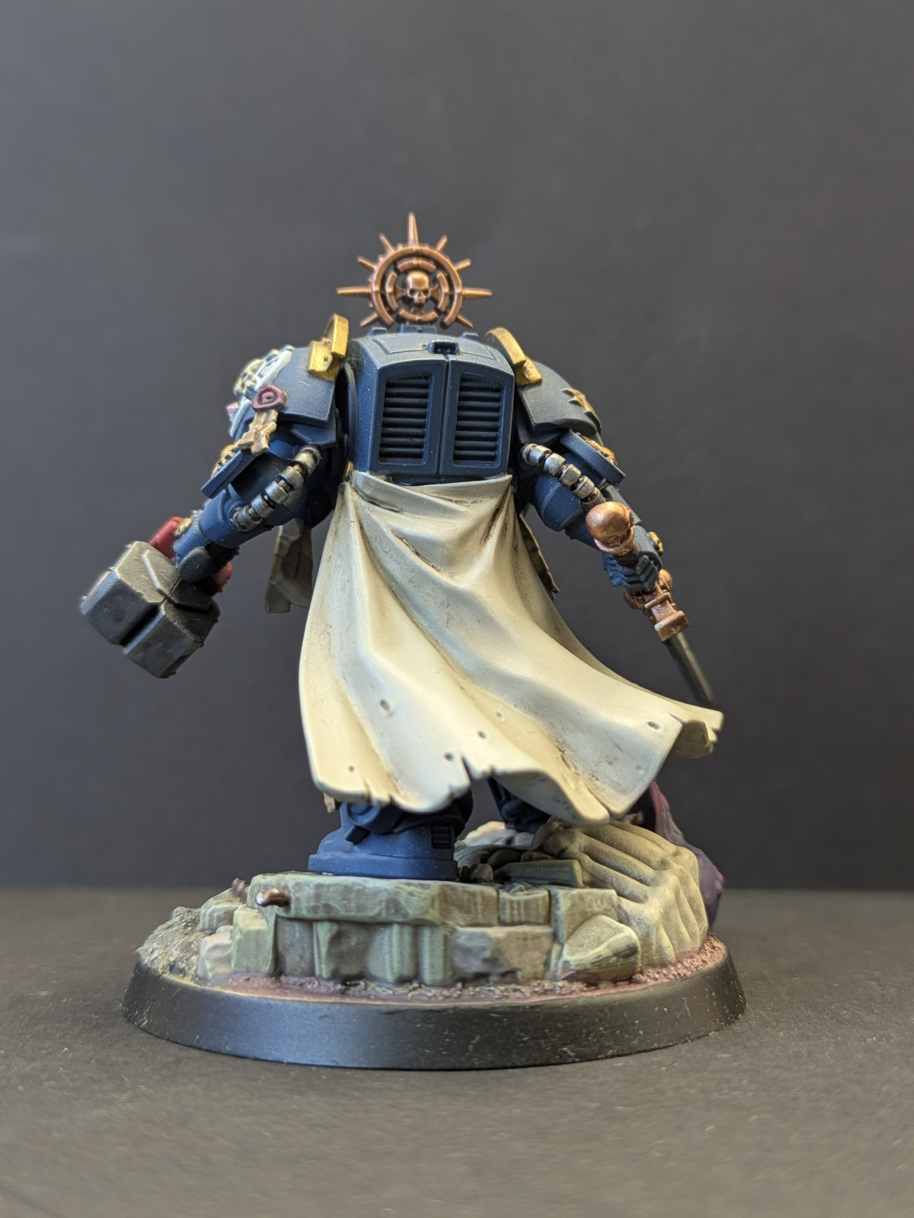 Back of the Captain showing iron halo and cape