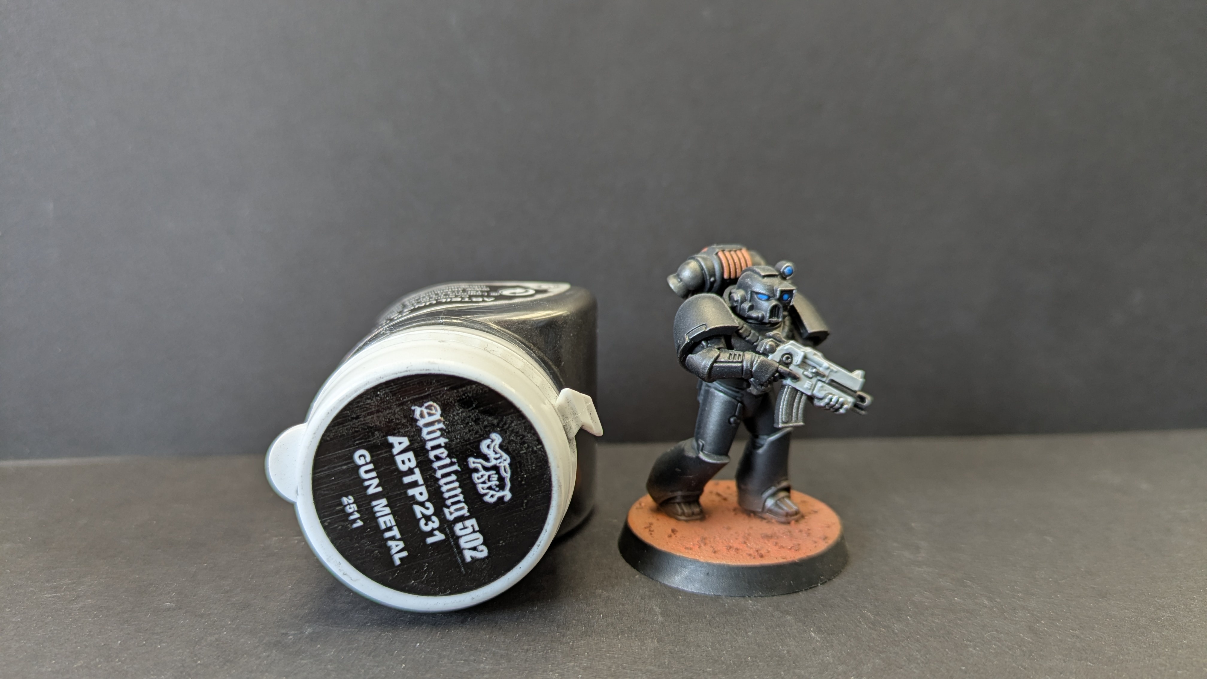 Iron Warrior posed with Abteilung 502 Gun Metal Pigment