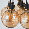 Artcraft Lighting Gem Collection 7-Light Pendant with Amber Glass Black and Brushed Brass (AC11877AM)