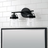 Madison 14" W x 9.5" H 2-Light Vanity in Matte Black with Clear Seeded Glass (147021MB-534)