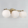 Ansley 22.75"W x 8"H 3-Light Circular Globe Vanity in Aged Brass with Soft White Glass (152131AD-548)