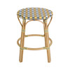 Butler Specialty Company Ballito 24.5 in. Seat Height Oval Rattan Counter Stool with Footrest, Yellow and Brown (6283519)