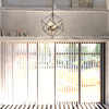 Vaxcel Rad 23.5-in. 4 Light Pendant Black and Natural Brass (P0307R)