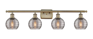 Athens Deco Swirl - 4 Light - 36 inch - Antique Brass - Bath Vanity Light (516-4W-AB-G1213-6SM) Athens Deco Swirl - 4 Light - 36 inch - Antique Brass - Bath Vanity Light (516-4W-AB-G1213-6SM)