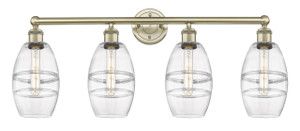 Vaz - 4 Light - 33 inch - Antique Brass - Bath Vanity Light (616-4W-AB-G557-6CL) Vaz - 4 Light - 33 inch - Antique Brass - Bath Vanity Light (616-4W-AB-G557-6CL)