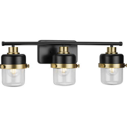 Beckner Collection Three-Light Matte Black Clear Glass Urban Industrial Bath Light with Vintage Brass Accents (P300424-31M)