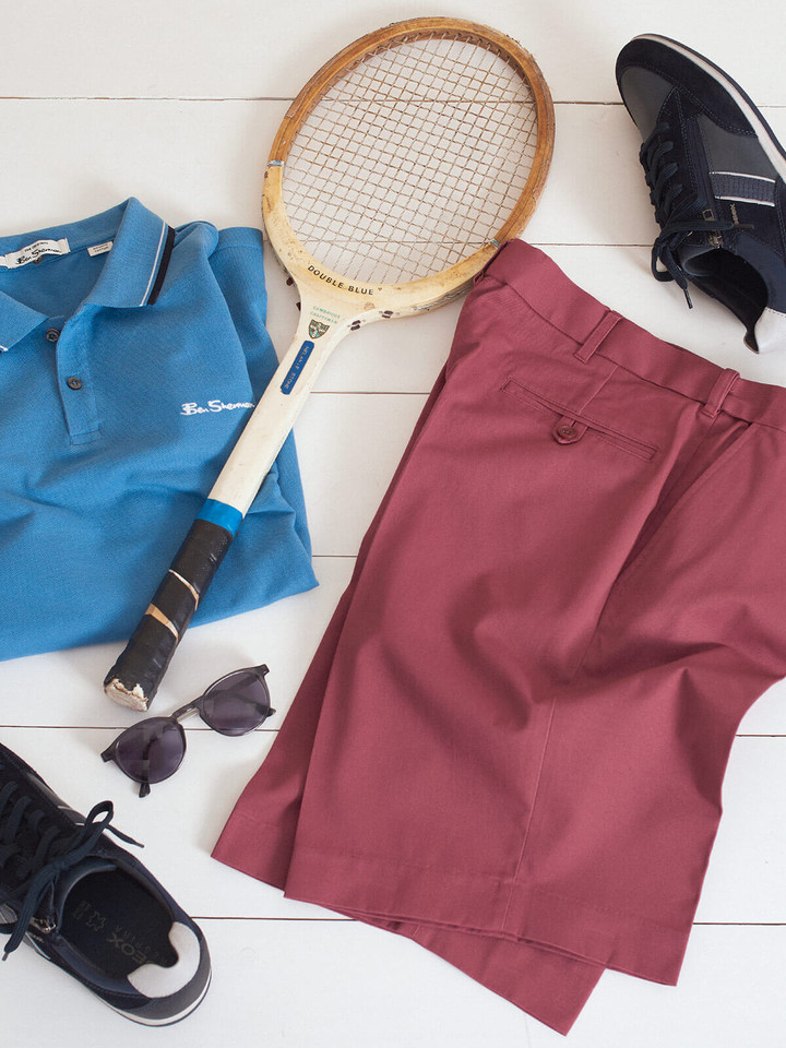 Flat Lay Image of Blue Ben Sherman Polo Shirt and Red Tailored Shorts