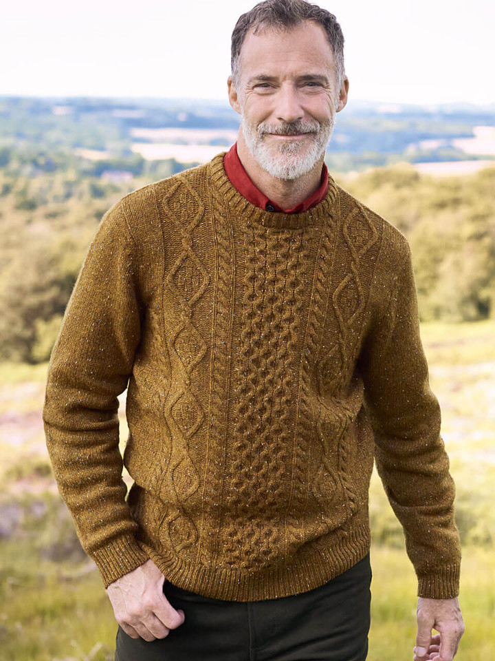 Model wears Men's Mustard Donegal Cable Knit Jumper