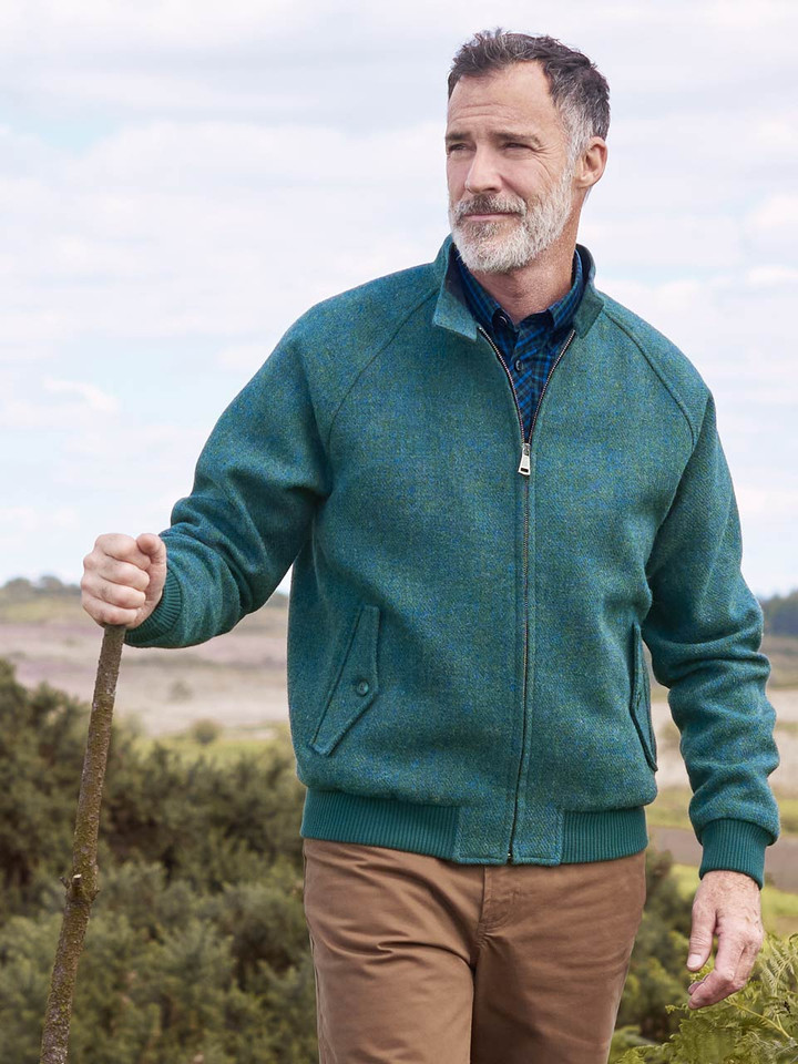 Model wears Green Harris Tweed Harrington Jacket