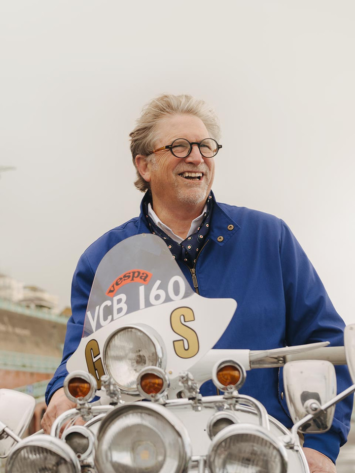 Lord Trousers sitting on 1964 Vespa GS