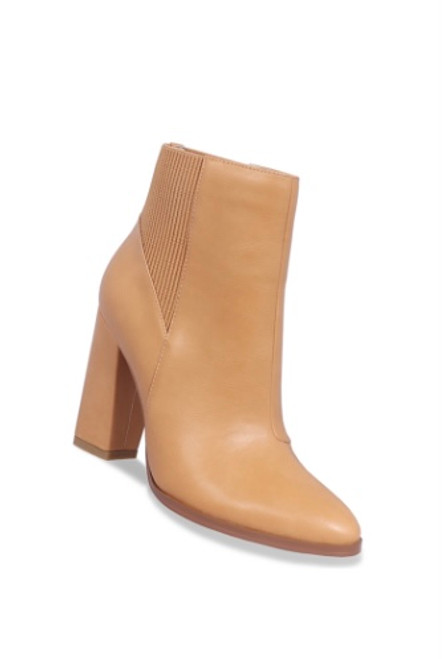 The colder season’s new best friend; the Flynn ankle boots combine comfort and style with a subtle pointed toe and elastic gusset. Set on a 10cm block heel, showcase these with a midi dress and coat for casual winter styling.

This boot features:

Pointed toe
Elastic panel at back
Tight fit
Fit: Please note elastic uppers can be a wriggle to get on. For the first wear, we advise you wear stocking socks to allow it to stretch. This boot is a fitted style so we highly recommend going up a size. For this style EU 36.5 = size 7.

Heel Height: 10cm

Composition: PU upper, Synthetic lining, Resin sole
Suburban Closet