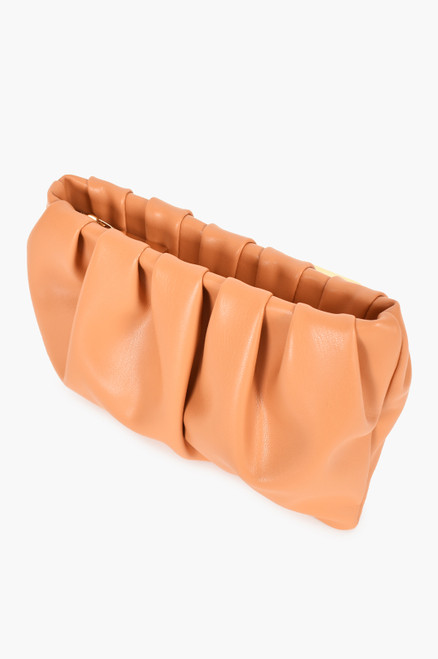 This stunning toffee pleated pouch is perfect to pair with your favourite linen pieces or denim for a casual luxe look or for a glam look style with heels and a slip for an evening out!

This pouch features:

Pleated detail
Recessed zip top closure
Plenty of room for necessities
Colour: Toffee
Material: Vegan Leather
Suburban Closet