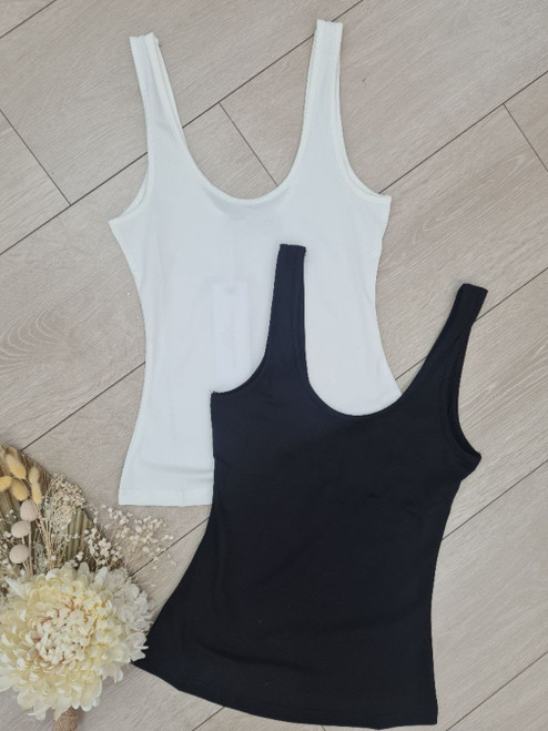 Our Betsy Basic Tank Top is the perfect staple for your wardrobe! This singlet features thick straps and is perfect for wearing on its own in summer or layering in winter.

This tank features:

Round neckline
Thick straps
Cotton blend
Colour: White or Black

Fabric: 93% Cotton; 73% Spandex

Size Guide: Sizing up one size is recommended.