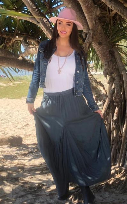 Our funky Mirabel Peasant Skirt is a comfy, everyday style skirt with a very unique design. We love that the elasticised waist and functional drawstring means it will fit anyone from a size 8 to 18! We also love the fact that this gorgeous skirt has pockets!!!

This skirt features:

Elastic waist with functional drawstring
In seam pockets
Peasant style
Unique design
Colour: Steel Grey

Fabric: 100% Rayon

Size Guide: OSFA from 8-18.