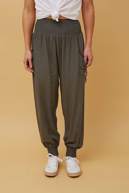 Our gorgeous Eden Harem Pants are perfect for lounging around, doing yoga or just going about your day to day activities in. They're stylish, lightweight and comfortable and the side pokets make them practical! These pants will be on high rotation in you wardrobe for most of the year!

These pants feature:

High, shirred waist
Side pockets
Elasticised at the ankle
Flowy 
Colour: Khaki

Fabric: 100% Viscose

Size Guide: True to size