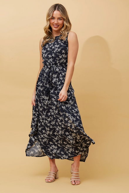 Our gorgeous Belinda Floral Dress is a versatile and easy to wear style that can easily be dressed up or down. Pair with sandals for a chic casual look or elevate your look in white strappy heels.

This dress features:

Round neckline with keyhole detail
Sleeveless
Drawstring waist with tassel tie
Button closure at back
Asymmetrical hemline
Unlined
Colour: Navy with White Floral

Fabric: 80% Viscose; 20% Polyester

Size Guide: True to size. Model wears a size 8 and is 171cm tall