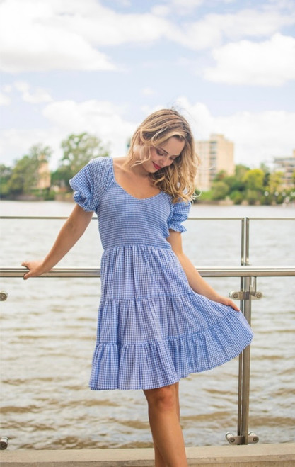 Our super cute and super sweet Alice Gingham Dress is just so fun! Made from 100% cotton and featuring a sweetheart neckline and puff sleeves with frill details, this versatile dress can be worn casually with white sneakers or dressed up with heels.

This dress features:

Sweetheart neckline
Shirred bodice
Short puff sleeves with frill detail
Tiered skirt with frilled hemline
Unlined
Colour: Blue

Fabric: 100% Cotton

Size Guide: True to size. Stick to your usual size.
