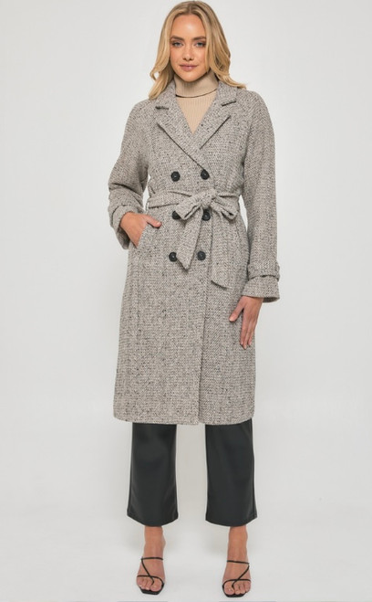 Our Brody Faux Wool Tweed Double Breasted Coat is a stunning and stylish piece that is perfect for colder weather. The double-breasted design of the coat is both stylish and practical, as it helps to keep the wind out and the warmth in. The coat also features two front pockets, which add both style and functionality.

This coat can be worn with a variety of outfits, from dresses and skirts to jeans and trousers. It can also be dressed up or down, depending on the occasion. For a more formal look, you can wear it with a dress or tailored pants and a blouse. For a more casual look, you can pair it with jeans and a knit.

This coat features:

Collared neckline with raglan shoulder

Double breasted design

Double row contrast buttons

Long sleeves with button cuff detail

Functional pockets
Removable waist tie

Fabric belt loops

Fully lined

Long line coat
Colour: Oat

Fabric: 100% Polyester

Size Guide: True to size. Model is wearing a size 8 and is 178cm tall.