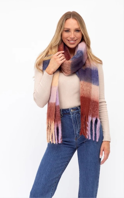 Our cosy, fluffy Bonnie Plaid Scarf is the perfect autumn/winter accessory for those freezing cold mornings. With it's wide width, it's perfect for that warm and cosy feeling.

This scarf features:

Fluffy fabrication
Tassel ends
Heavy weight
Colour: Rust

Fabric: 100% Polyester

Measurements: L: 190cm; W: 43cm