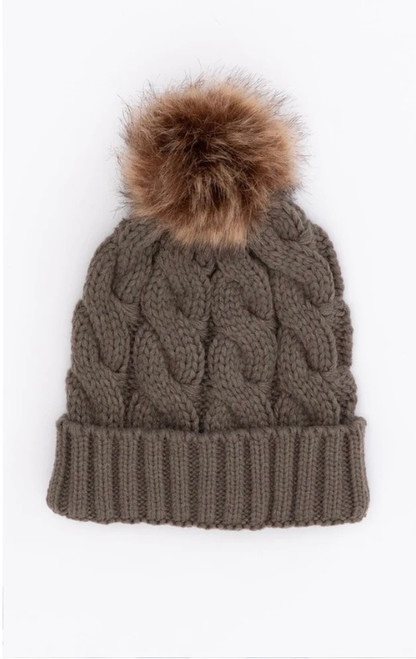 Whether you're hitting the slopes, watching kids sports or staying at home, our Cable Knit Beanie with Pom Pom is a must have in your wardrobe. The beautiful waffle knit design and trendy faux fur pom pom will keep you both looking cool and feeling cozy. 

Colour: Smoky

Fabric: Polyester

Size Guide: One size fits all!