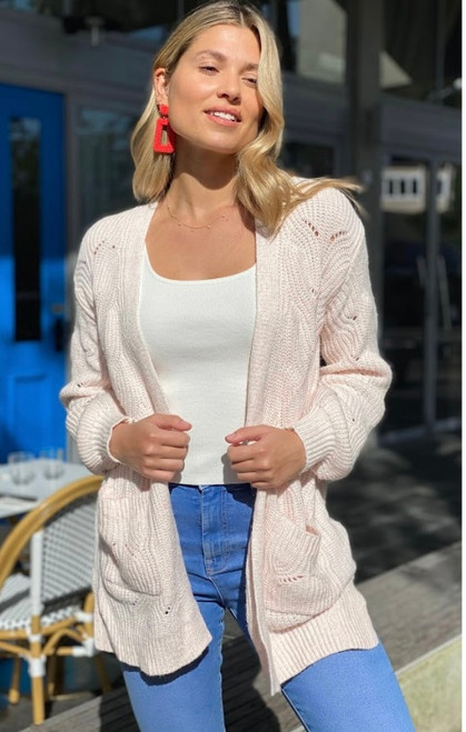 Our Antonia Cardigan is a cosy and stylish option this winter! The soft pink colour adds a feminine touch, which can be easily incorporated into your winter wardrobe. Layer it over a long-sleeved top and pair with your favorite jeans or leggings for a comfortable and casual look. You can also add some ankle boots and a scarf to complete the look and add extra warmth.

This cardi features:

2 Front pockets
Ribbed cuffs, front and hemline
Dropped shoulder
Relaxed fit
Has stretch
Colour: Pink

Fabric: 100% Acrylic

Size: Relaxed fit, perfect for layering. Model is 173cm tall and wears a size 8