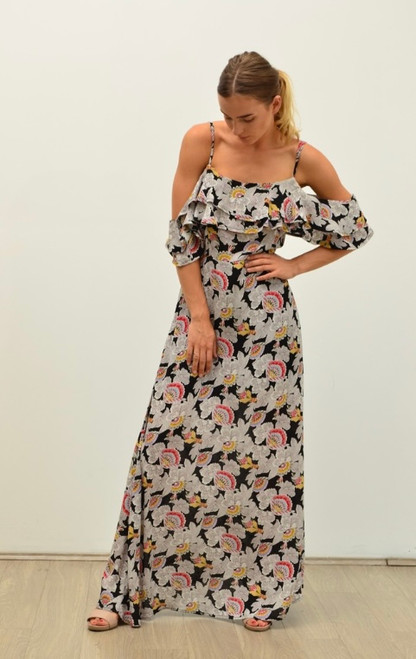 Our Gloria Ruffle Vintage Maxi Dress is fun, free spirited and flirty and perfect for those hot summer days or just lounging around in the sun at the beach when you're on vacation. Featuring a cold shoulder silhouette, this gorgeous dress is sure to become one of your Spring/Summer staples! Pair with our Tied in Knots Slides for a relaxed holiday look!

This dress features:

Ruffle along neckline and hem
Adjustable shoestring straps and dropped sleeve with ruffle
Invisible zipper at centre back
Lined under bust to knee
Maxi length
Colour: Black with Vintage Design

Fabric: 100% Rayon

Size: True to size