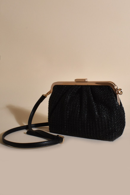 Our chic Lola Woven Crossbody Bag is perfect for work or play with its intricate woven detail in classic black and gold! This bag will go with a multitude of different outfits and can be used to elevate your look for many different ocassions or events. 

This bag features:

Metal clip closure
Internal pocket with zip closure
Removable shoulder strap
Man made weave detail
Gold-tone hardware
Colour: Black and Gold

Material: Man Made Weave & Plated Metal

Measurements: L:26cm H:16cm W:6cm