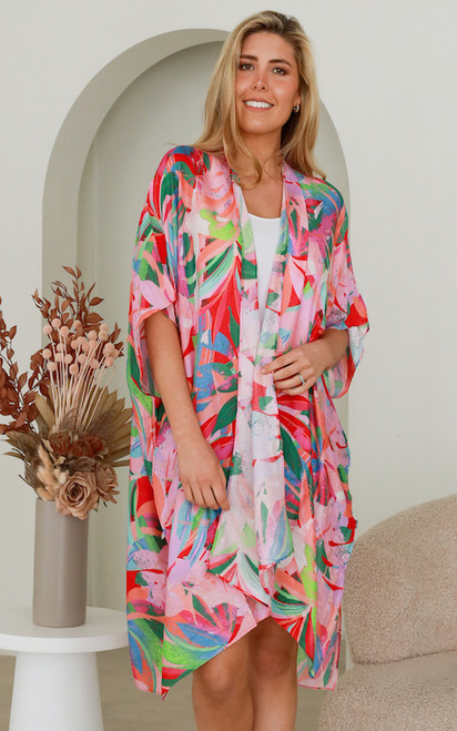 Our gorgeous Sun Set Kimono is perfect for throwing on over the top of a pair of shorts and your favourite tee or just over your swimmers when you're relaxing at the beach or at the resort this summer!

Colour: Pink

Fabric: Viscose

Size: OSFA