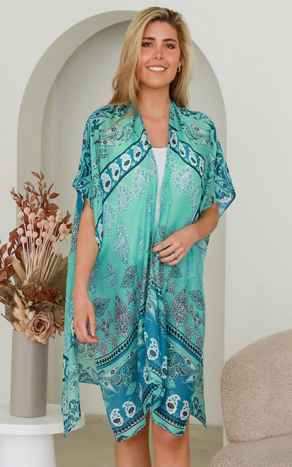 Our gorgeous Aquamarine Kimono is perfect for throwing on over the top of a pair of shorts and your favourite tee or just over your swimmers when you're relaxing at the beach or at the resort this summer!

Colour: Aqua

Fabric: Viscose

Size: OSFA
