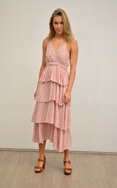 Our Dotti Layered Midi Dress is fun and flirty. It's perfect for a casual catch up with the girls or dress up for a fancy dinner date with your beau. Featuring floaty, layered tiers and adjustable straps, this gorgeous dress is sure to become one of your Spring/Summer staples! Pair with our Ibiza Strappy Slides in nude for a sweet, casual look!

This dress features:

Cross-over neckline
Adjustable shoestring straps
Elasticised waist
Elasticised at the back along top hemline
Tiered, frill overlay skirt
Midi length
Colour: Pink with White Polka Dots

Fabric: 100% Rayon

Size: True to size
