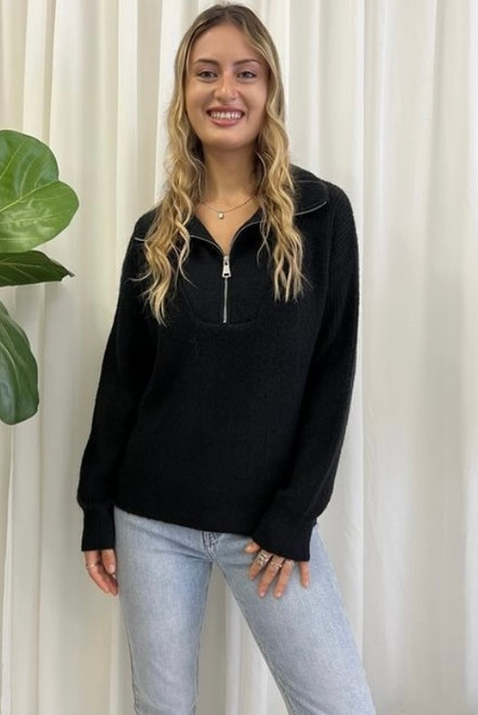 Our gorgeous Taylor Zip Knit is an easy go-to jumper that can be worn over anything! Pair with high-waisted jeans and sneakers for a casual and cosy look perfect for those weekend errands or our Wet Look Skinny Jeans for date night.

This knit features:

Collar with functional zip feature
Long sleeves with ribbed cuffs
Ribbed hemline
Dropped shoulders
Colour: Black

Fabric: 65% Acrylic, 35% Wool

Size Guide: S/M fits sizes 8-12, M/L fits sizes 12-16.