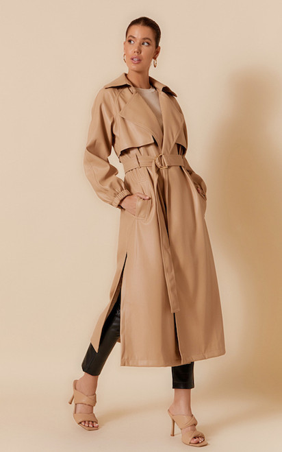 Our beautiful Jada Faux Leather Trench Coat is a versatile and timeless piece that will elevate any look this Autumn/Winter season! Featuring two side pockets and a tie up waist, this trench is both stylish and practical. This gorgeous trench can be worn over many different outfits, from dresses and skirts to jeans and trousers.

This coat features:

Collar
Tie waist closure
Long elasticised sleeves
Two side pockets
Side splits
Faux leather
Colour: Camel

Fabric: 45% PU, 55% Polyester

Size Guide: True to size. Model is 169cm Tall and is a Size 08.