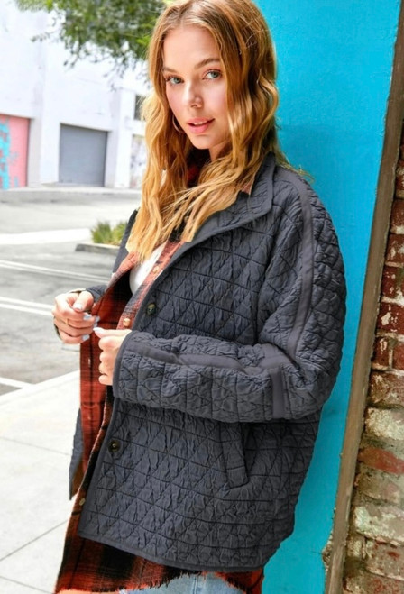Our Abbey Quilted Puffer Jacket is a great addition to your winter wardrobe. Our Abbey Quilted Jacket is a great addition to your winter wardrobe. Featuring a stylish patchwork design and oversized, slouchy fit, this jacket is perfect for layering when out and about on cold winter days. Wear over a knit and pair with your fave denim jeans and cute ankle boots for a chilled, casual look.

This jacket features: 

Funnel neck
Button up front
Long sleeves
Two functional side pockets
Quilted
Cotton blend
Oversized, relaxed fit
Colour: Charcoal

Fabric: 50% Cotton, 50% Polyester

Size Guide: Relaxed fit.

Featuring a stylish patchwork design and oversized, slouchy fit, this jacket is perfect for layering when out and about on cold winter days. Wear over a knit and pair with your fave denim jeans and cute ankle boots for a chilled, casual look.

This jacket features: 

Funnel neck
Button up front
Long sleeves
Two functional side pockets
Quilted
Cotton blend
Oversized, relaxed fit
Colour: Charcoal

Fabric: 50% Cotton, 50% Polyester

Size Guide: Relaxed fit.