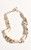 Make a bold statement with our Moulded Metal Short Statement Necklace. This striking piece features uniquely shaped, gold-plated metal segments that have been artfully moulded to create an organic, hammered texture. The short, choker-style length sits perfectly at the collarbone, drawing attention with its contemporary design and eye-catching shine. It's the ideal accessory to instantly elevate any outfit, adding an edgy yet sophisticated touch.

This necklace features: 

Moulded metal details
Loop & toggle closure
Adjustable length
Statement necklace
Short necklace
Colour: Yellow Gold

Material: Plated Metal

Length: 32cm plus Extension