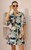 Step into vacation mode with our stunning Riviera Shirt Dress! This exquisite piece captures the essence of a serene getaway with its vibrant tropical print, featuring lush palms and charming architectural details. Crafted for effortless elegance, this versatile shirt dress boasts a flattering tie-waist and comfortable silhouette, making it perfect for resort wear or summer outings. Pair with our Tied in Knots Slides for a chic, relaxed look.
This dress features:
Collar
Functional button up front
Functional side pockets
Wide, short sleeves
Removable waist tie
Knee length 
Lined 
Colour: Black with Tropical Print 
Fabric: 100% Rayon
Size Guide: True to size! Model is wearing a size 8 and is 178cm tall. Step into vacation mode with our stunning Riviera Shirt Dress! This exquisite piece captures the essence of a serene getaway with its vibrant tropical print, featuring lush palms and charming architectural details. Crafted for effortless elegance, this versatile shirt dress boasts a flattering tie-waist and comfortable silhouette, making it perfect for resort wear or summer outings. Pair with our Tied in Knots Slides for a chic, relaxed look.
This dress features:
Collar
Functional button up front
Functional side pockets
Wide, short sleeves
Removable waist tie
Knee length 
Lined 
Colour: Black with Tropical Print 
Fabric: 100% Rayon
Size Guide: True to size! Model is wearing a size 8 and is 178cm tall.