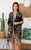 Step into a world of vibrant beauty with our Enchanted Garden Kimono. This captivating piece showcases a rich, dark background adorned with an intricate tapestry of colorful florals and lush foliage. The bohemian-inspired border print along the edges adds an extra touch of artisanal charm. Crafted from a lightweight, flowing fabric, this kimono is a versatile layering essential. Perfect for elevating a simple tank and shorts, complementing a swimwear look, or adding a touch of sophisticated flair to any outfit, it's designed to bring an artistic and elegant touch to your wardrobe.

Colour: Black

Fabric: 100% Viscose

Size: OSFA